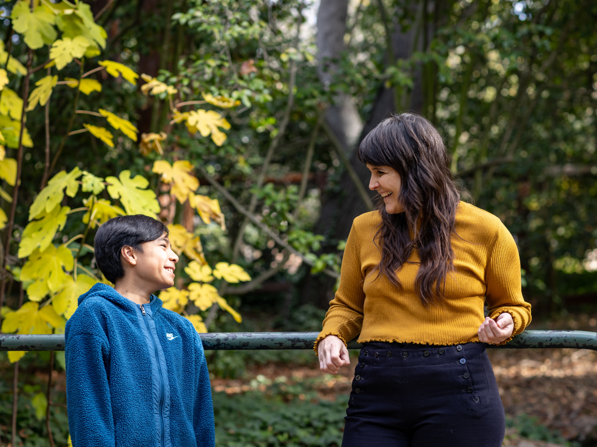 cognitive behavioral therapist for childhood anxiety treatment talking to a kid