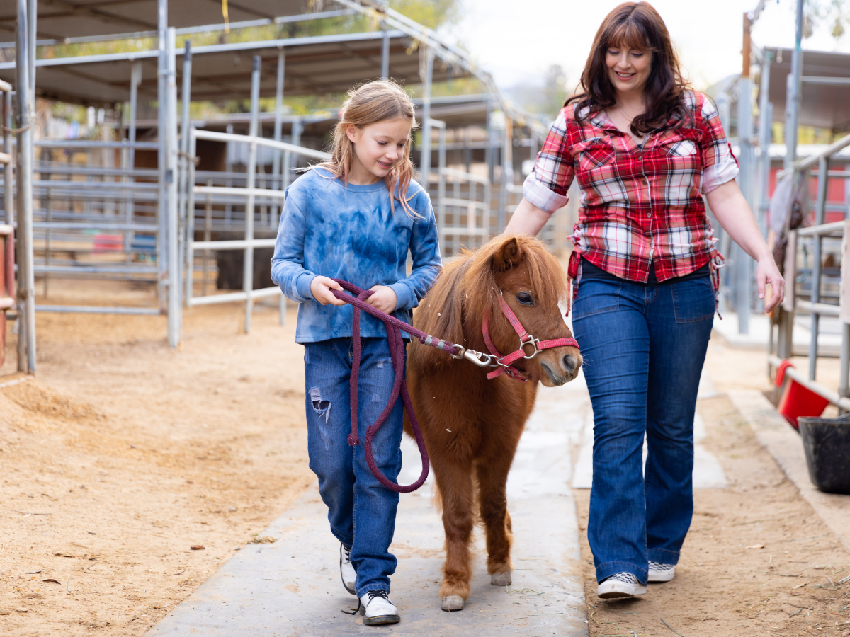 equine therapy specialist during a session with her childhood anxiety patient